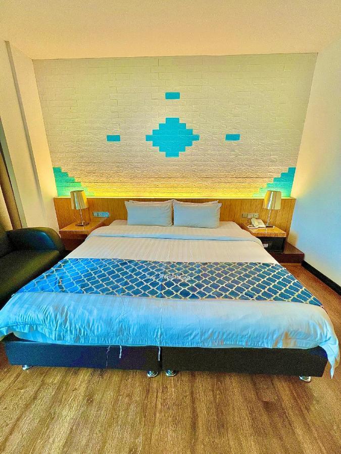 New World Express Motel Бінтулу Екстер'єр фото
