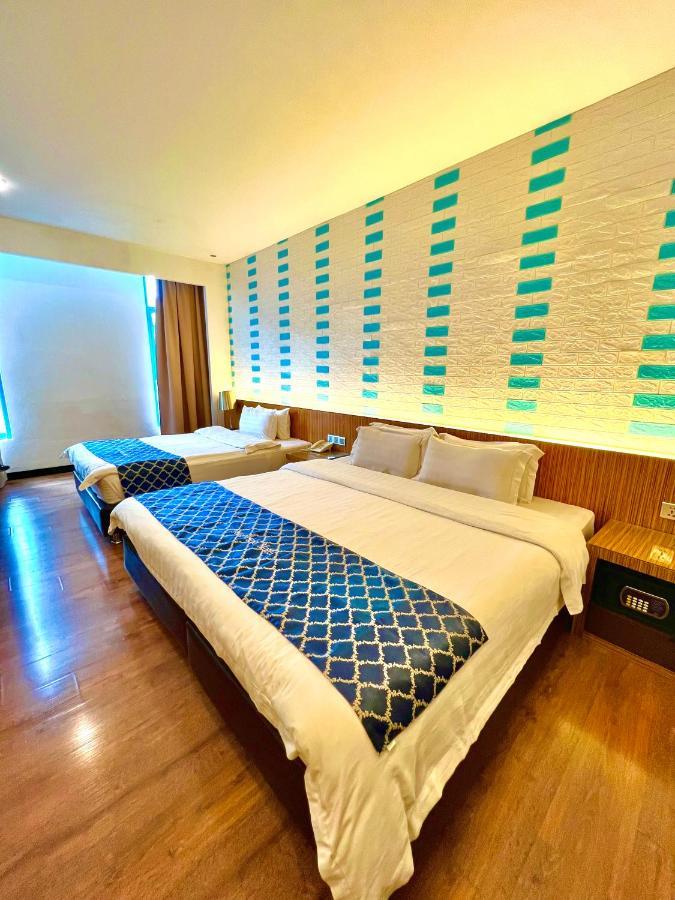 New World Express Motel Бінтулу Екстер'єр фото