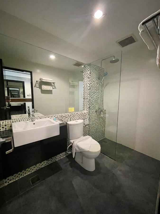 New World Express Motel Бінтулу Екстер'єр фото