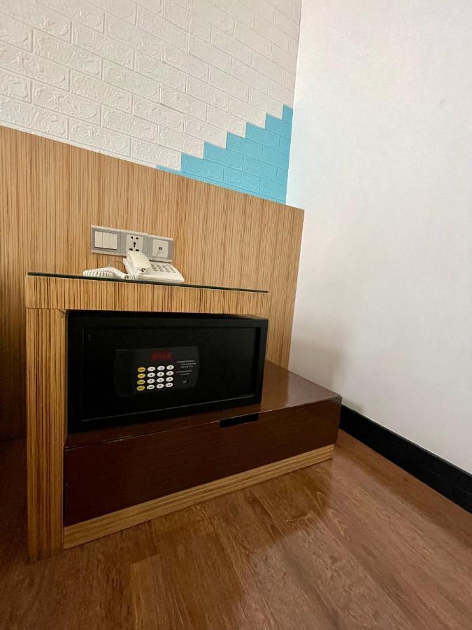 New World Express Motel Бінтулу Екстер'єр фото